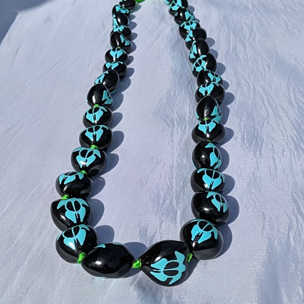 Turtles on black beads necklace
